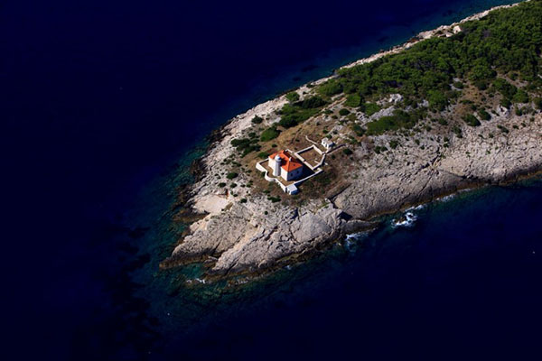 Lighthouse on Four Day island hopping tour views - AndAdventure Croatia