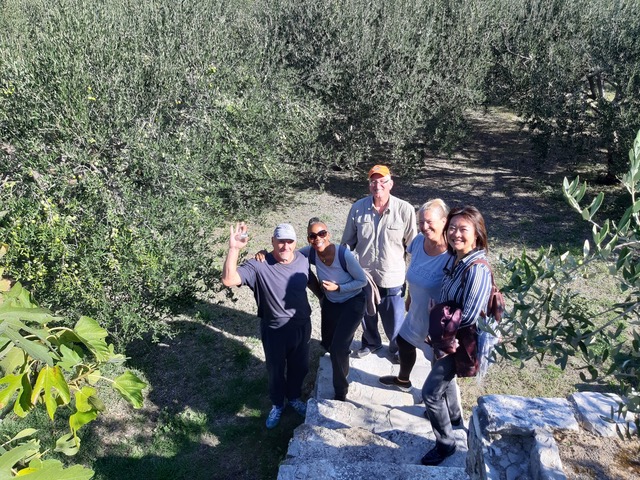 Meeting a local family in a olive grow